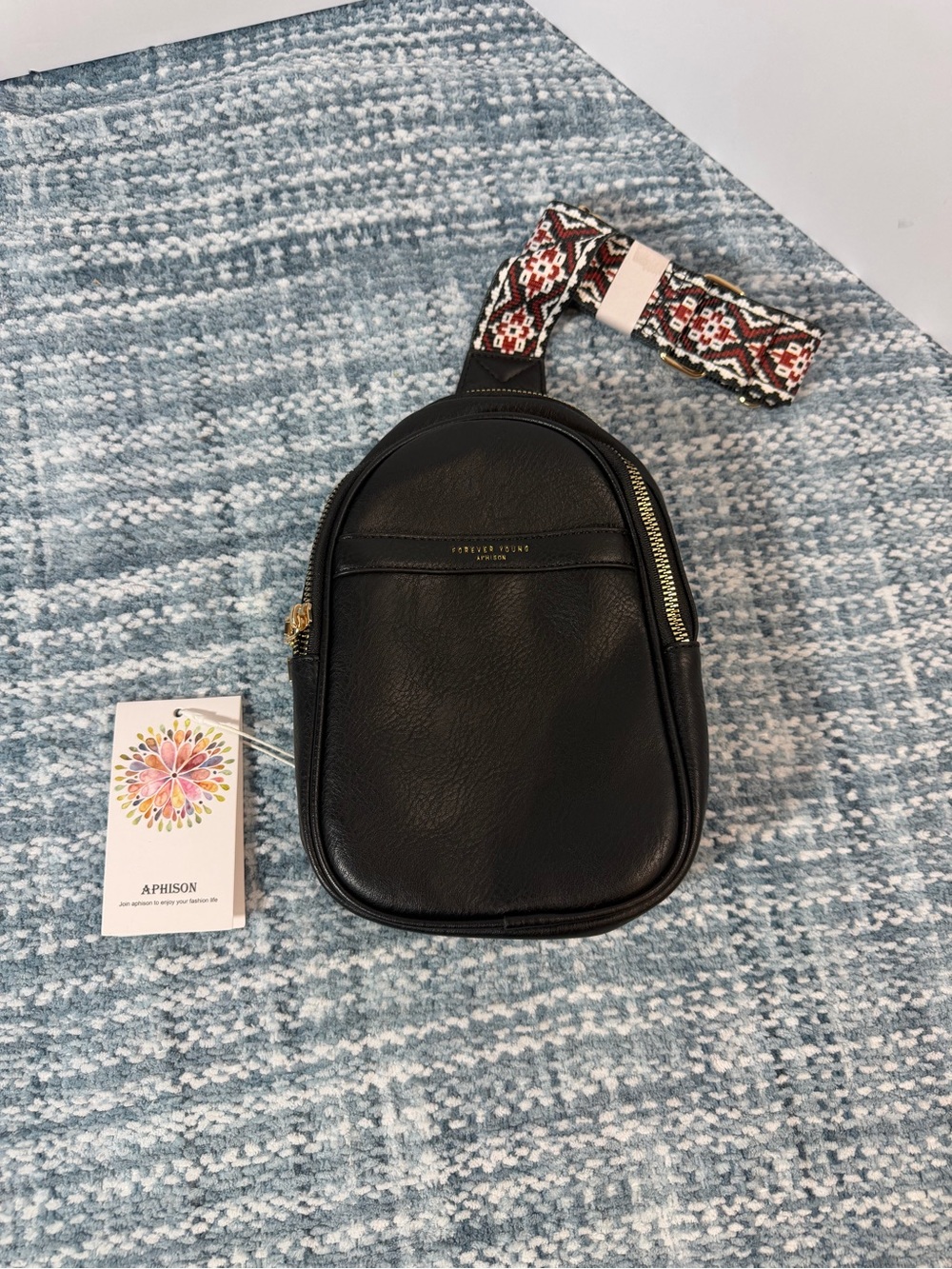NEW Black Crossbody Sling Bag with Patterned Strap never fully opened